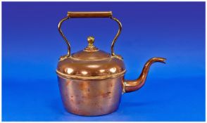 Copper Kettle with partially brass handle and finial to cover; 10.75 inches high overall; indistinct