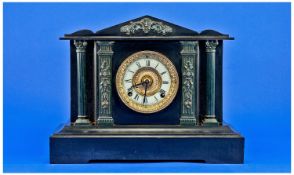 Ansonia Clock Co. New York. Black Marble Mantle Clock. 8 day striking movement on a gong. Circa