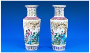 Pair of Modern Oriental Vases, one with a chip. 12 inches in height.
