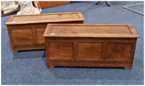 Pair of Solid Walnut Lidded Chests, each with panelled top, front, sides and back, the front friezes