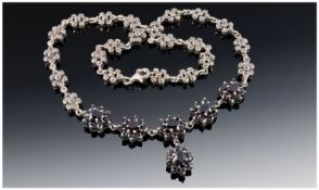 Early 20th Century Silver and Garnet Set Necklace.