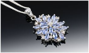 Tanzanite And Diamond Set Pendant, Suspended On A Fine Silver Chain.