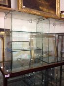 Pair of Glass Shelving Units, with removable shelves, each measuring 24 inches high, 16 wide and