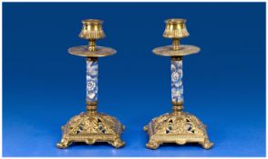 Pair of Victorian Brass Candlesticks with blue pottery stems and decoration.