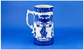 Grimwades Tudor Art Nouveau. Blue and White Jug. Printed mark for 1886 -1900. Chip to Spout. 8.75