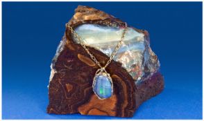 18ct Gold Mounted Queensland Boulder Opal, Polished Free Form Showing Flashes Of Greens, Blues &