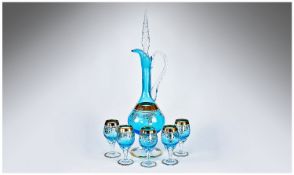 Italian Decanter Set, probably mid 20th century, in a blue colour with gilt decoration, complete