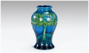 Moorcroft Small Vase `Moonlit Blue` Pattern, Circa 1925. 4`` in height. Mint condition in all
