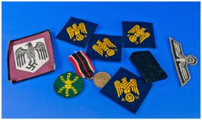 Collection of Reproduction Nazi Cloth Badges and Medal.
