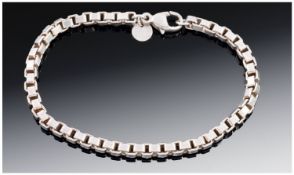 Silver Box Link Bracelet, With Small Tab Marked Tiffany & Co. Together With Pouch And Outer Box.