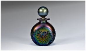 An Iridescent ``Phoenician Glass`` Scent Bottle, with ball stopper and collar. Etched Phoenician
