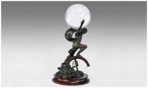 Stuart Mark Freeman Bronze Figure Of Atlas Holding a Crystal Ball picturing the Earth. Raised on a