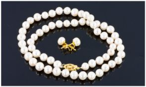 White Akoya Pearl Necklace And Matching Earrings.