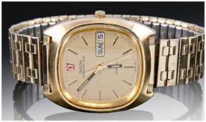 Omega Megaquartz 32 KH2 Gold Plated Gentleman`s Wrist Watch With Square Dial. Baton markers, day