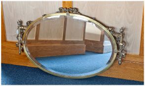 Ornate Edwardian Brass Framed Oval Hanging Mirror, with bevelled edge glass, the top and sides