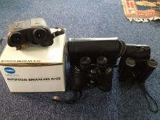 Collection Of Binoculars Including boxed Minolta Autofocus 8x22 binoculars plus two other cased