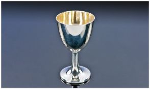 Chinese Export Silver. A Pedestal Egg Cup of Minimalist Form with Silver Gilt Interior. Marked 90