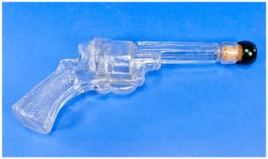 Small Victorian Decanter, in the form of a pistol, in pressed glass.
