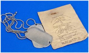 Set Of Two Dog Tags, Chain And Brown Paper Bag With Instructions.