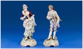 Volkstedt Fine Pair Of Porcelain Handpainted Figures, lady & gentleman dressing in 18th Century