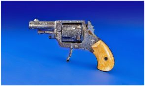 A Ladies Deringer Type Pistol. Steel barrel engraved with floral motifs and with bone handle.