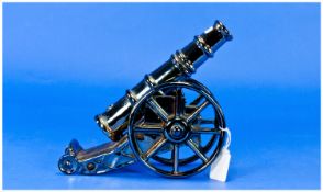 1930`s Silvered Lustre Cast Iron Model Cannon, Reg Number 889867. 8.25`` in height. 9`` in width.