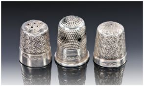 Three Silver Thimbles.