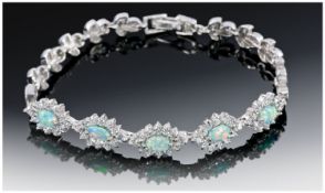 Silver Bracelet, Set With Opal Coloured Stones