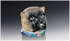 An Edwardian Hand Painted Chalk Pin Holder in the form of a bull dog. 2 inches high.