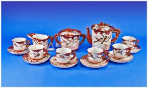 Japanese Kutani 15 Piece Tea Service depicting exotic birds on ground and in flight. Signed to base.