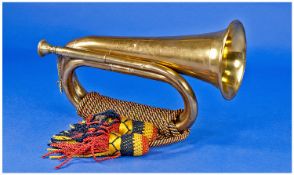 Brass Bugle with rope padding, and decorative tassels, probably mid 20th century.