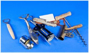 Bag of Various Items, including corkscrews, bottle openers, bottle stoppers, Dolphin figural