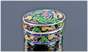 An Attractive Oval Sterling Silver and Cloisonne Enamel Box with pull off lid. Enamelled in pink,