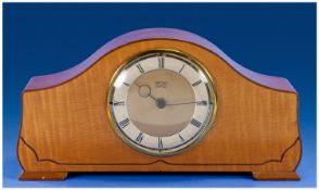 Smith Art Deco Satinwood Cased Mantel Clock, 8 day movement, 6 inches high, 11.5 inches wide.