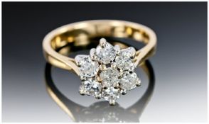 Ladies 18ct Gold Diamond Cluster Ring. Flowerhead setting with seven brilliant cut diamonds in white