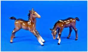 Beswick Foal Figures (2 in total) 1. foal grazing model number 946, 2. Foal stretched. Model
