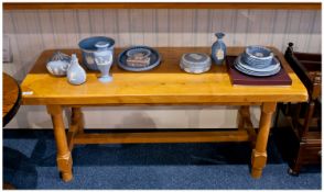 Solid Sycamore Coffee Table, raised on turned legs and joined by stretchers, measuring 18½ inches