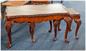 Nest of Three Walnut Tables, comprising one long table and two small tables, all with burr walnut