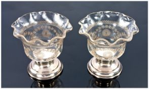 Two Etched Glass Dishes With Wavy Edges Raised On Silver Bases. Hallmarked For Birmingham 1911.