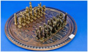 Large Coppered Circular Chess Tray, stamped, reading `Hurghada` and `Red Sea`, the tray depicting