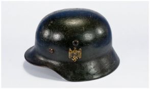 A German World War II S.S. Helmet with leather interior