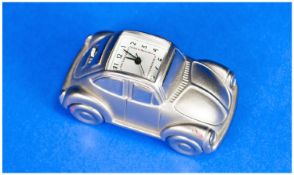 A Miniature Clock In The Form Of A Volkswagon Car. 2.25`` in length.