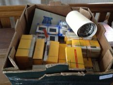 Large box of slides and photos.