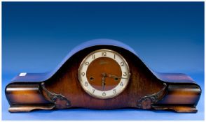 1920`s Oak Cased Elongated Napoleon Hat Shaped Mantel Clock, with eight day striking movement,