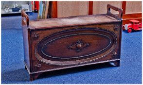 Early 20th Century Oak Bench, the seat with lid opening to reveal storage area, the front with