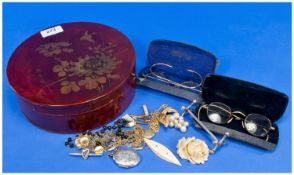 Lacquered Circular Box, Containing An Assortment Of Costume Jewellery And Oddments, Comprising
