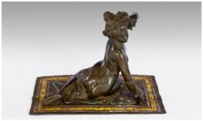 Vienna Style Bronze of a Lady Seated on a Rug.