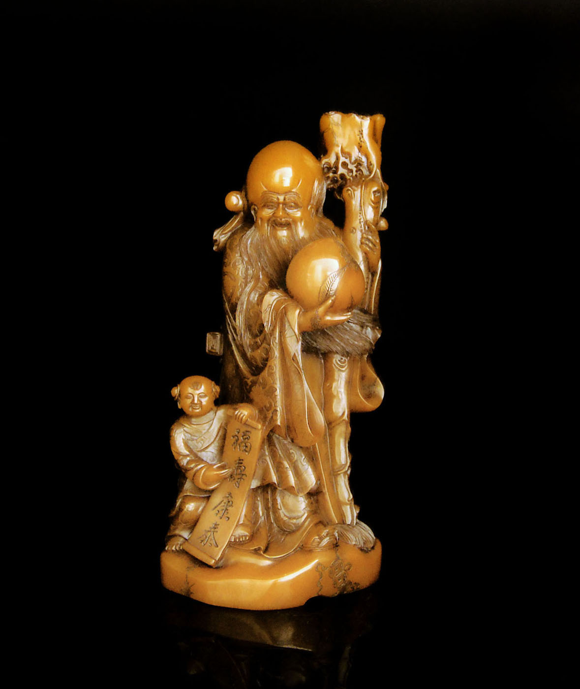 ????????????  A Well Carved Shoushan Stone Figure of God of Longevity with Child Bearing an