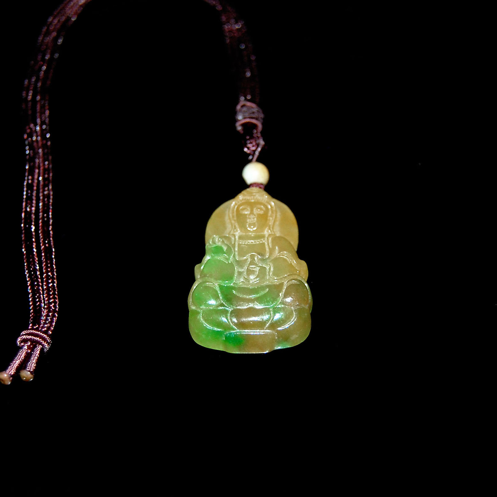 ????????????  Glass Yellow Jadeite Carved with Guanyin Pendant Length: 2 in. (5.1 cm.)  Width: 1?