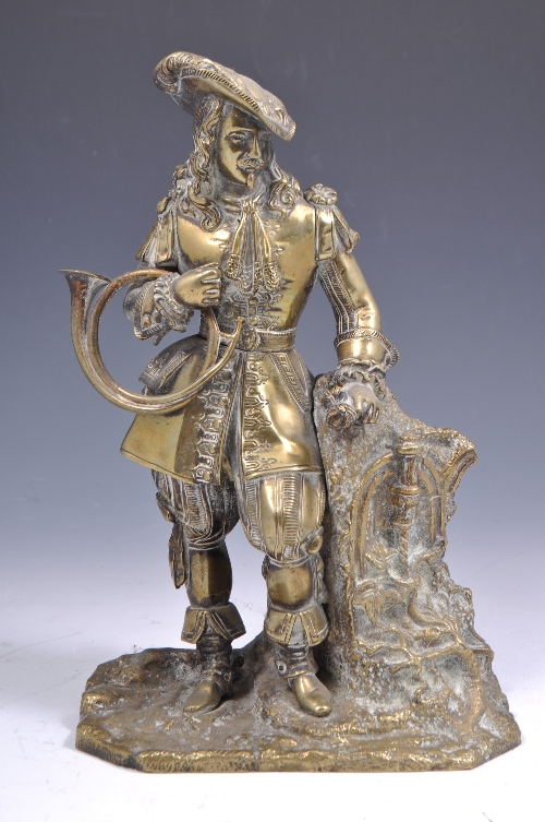 Cast brass model of a cavalier, 28cms.